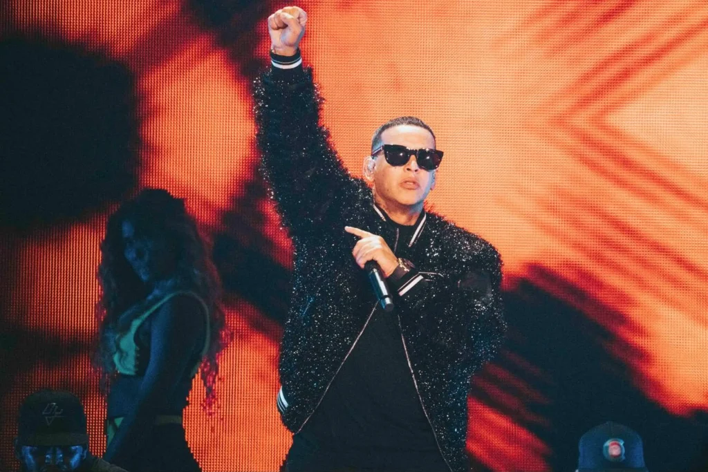 Daddy Yankee performing on stage during his Legendaddy Tour, showcasing his electrifying presence and global influence