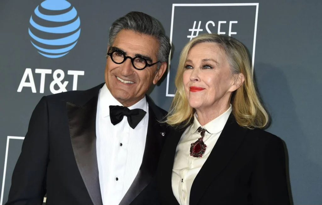Eugene Levy and Catherine O'Hara at the 2019 Critics' Choice Awards, celebrating their success with Schitt's Creek