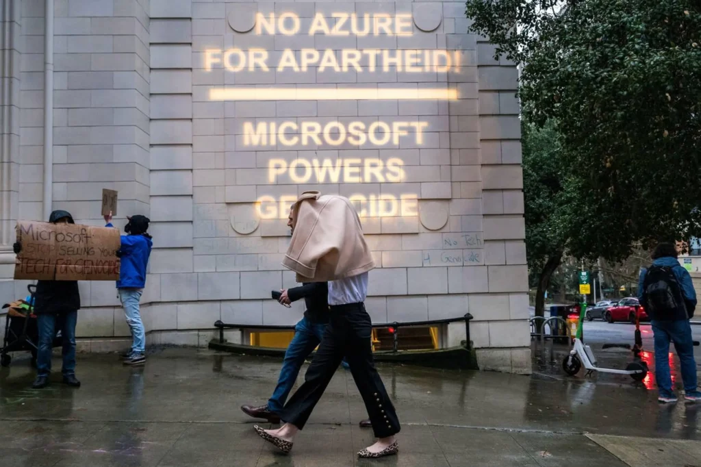 Seattle, USA. 20th Mar 2025. Just after 5:00pm Pro Palestine protestors gather at Seattle’s Geekwire Microsoft @ 50 event at Townhall